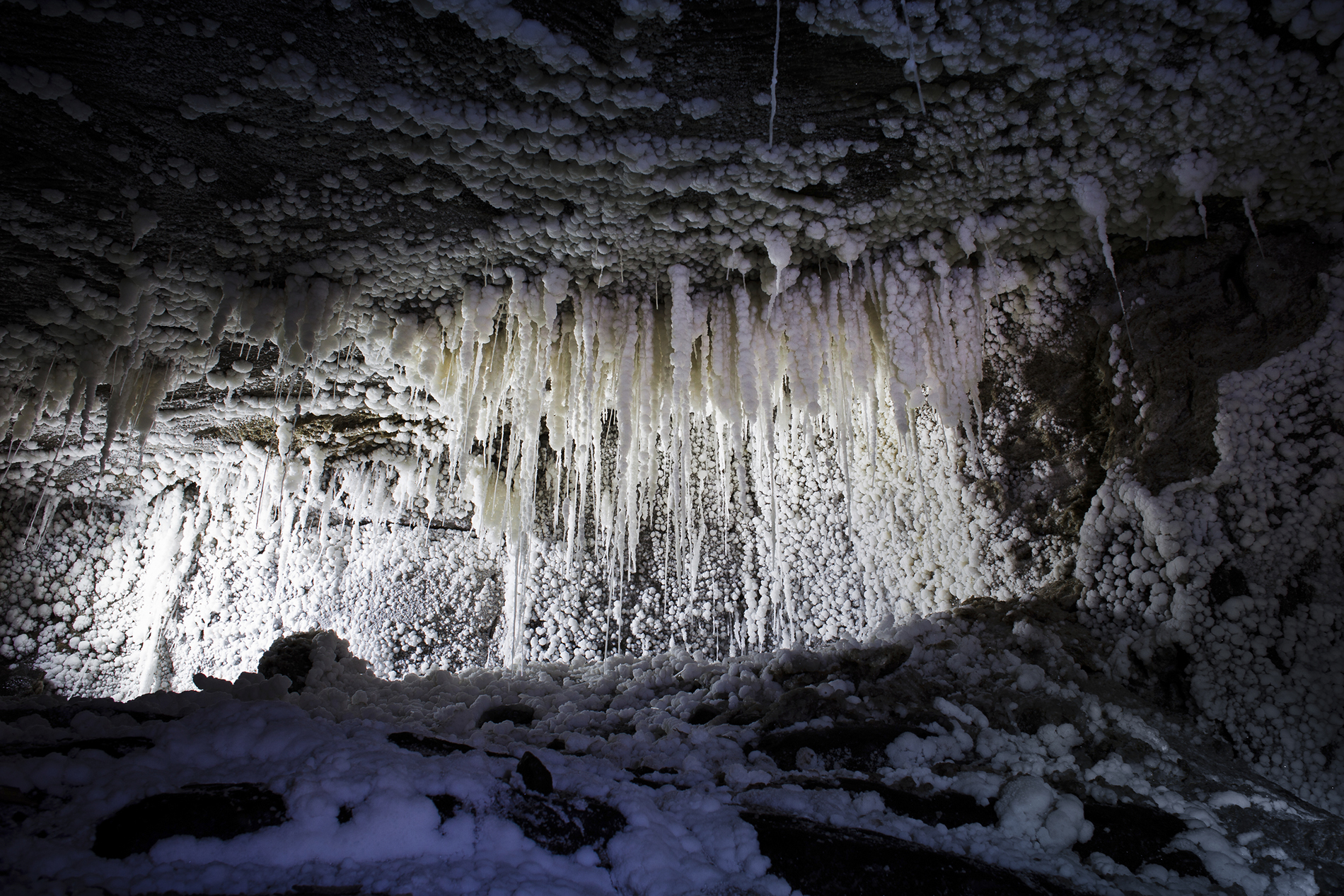 Panorama of cave with salt stalacites, natural reserve.